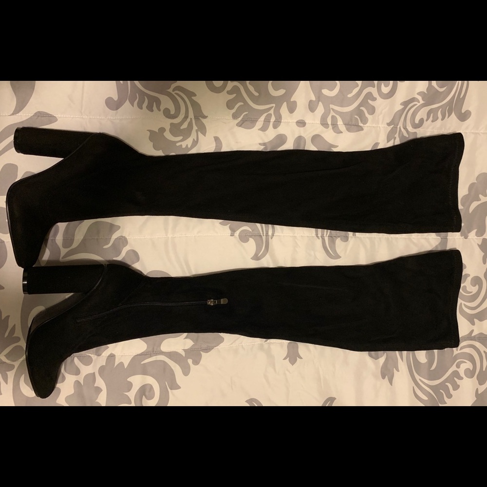 Thigh high black suede boots